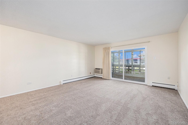 350 S Clinton St Unit 2A, Denver, CO 80247 - carpeted spare room featuring a baseboard radiator and a wall unit AC