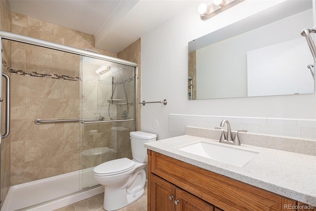 350 S Clinton St Unit 2A, Denver, CO 80247 - full bathroom with vanity, a stall shower, and tile patterned floors