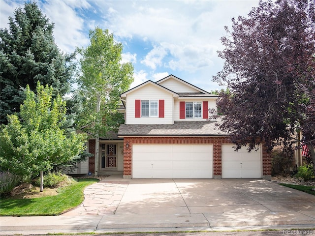 front of property with a garage