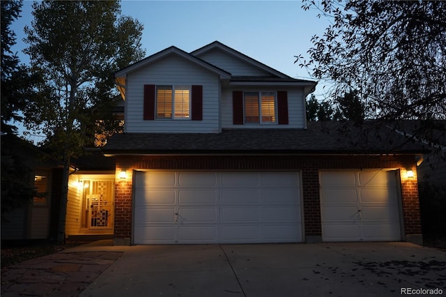 front of property featuring a garage