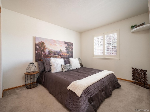 bedroom with light carpet