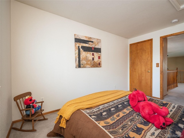 bedroom featuring carpet