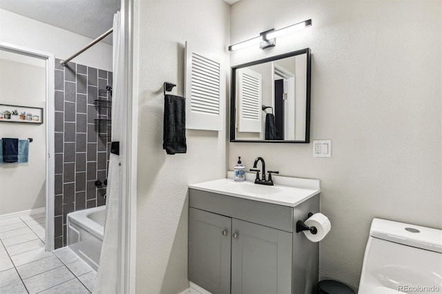 bathroom with toilet, tile patterned floors, shower / tub combination, and vanity