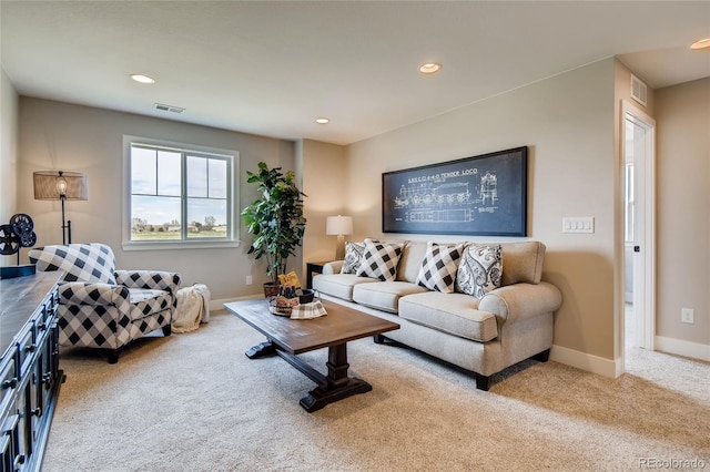 living room with carpet, visible vents, baseboards, and recessed lighting