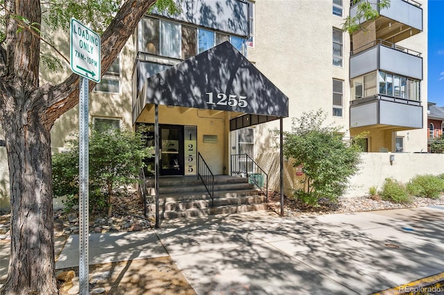 1255 N Ogden St Unit 305, Denver, CO 80218 - view of front of house with stucco siding