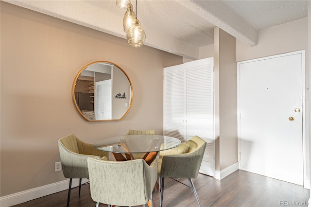 1255 N Ogden St Unit 305, Denver, CO 80218 - dining room with wood finished floors and a textured ceiling