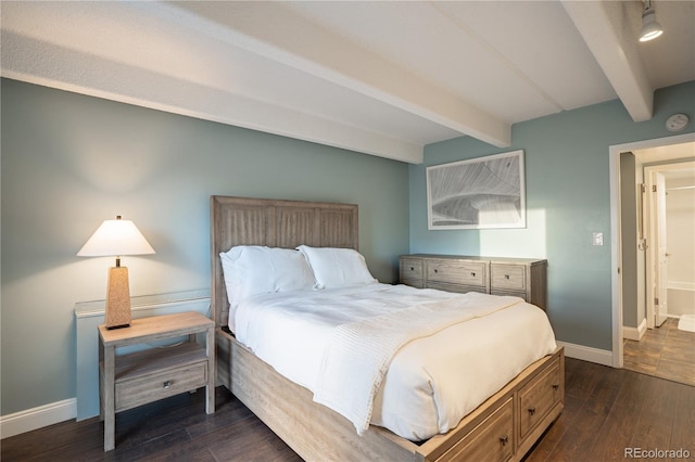 1255 N Ogden St Unit 305, Denver, CO 80218 - bedroom with beam ceiling and dark wood finished floors