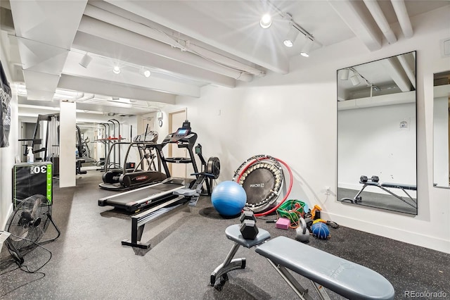 1255 N Ogden St Unit 305, Denver, CO 80218 - exercise room with rail lighting and beamed ceiling