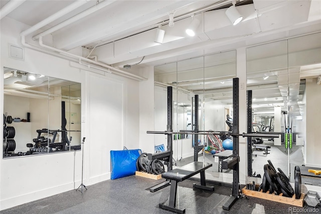 1255 N Ogden St Unit 305, Denver, CO 80218 - exercise room with baseboards