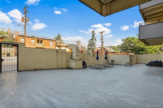 1255 N Ogden St Unit 305, Denver, CO 80218 - view of patio / terrace with a gate