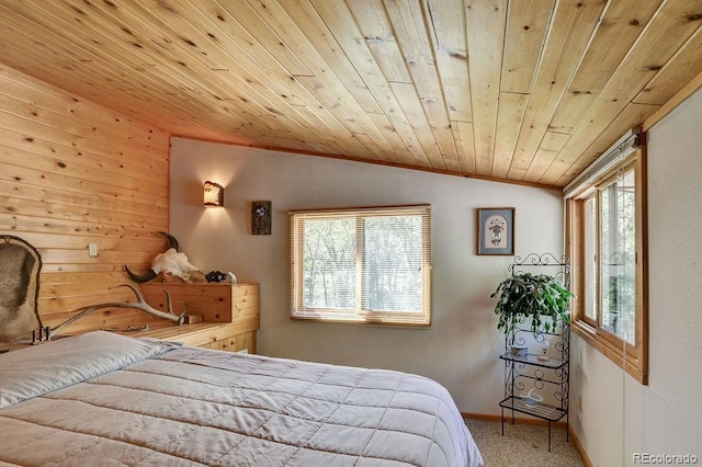 carpeted bedroom with wooden ceiling, baseboards, and lofted ceiling