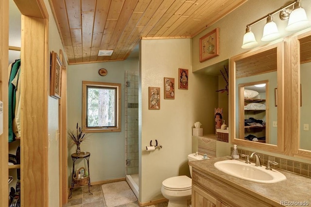 bathroom with toilet, a stall shower, wooden ceiling, lofted ceiling, and vanity