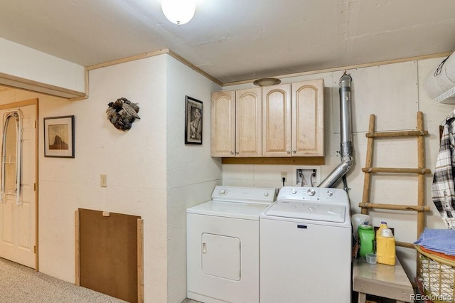 laundry area with cabinet space and washing machine and clothes dryer