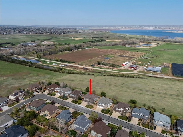 aerial view with a water view and a residential view