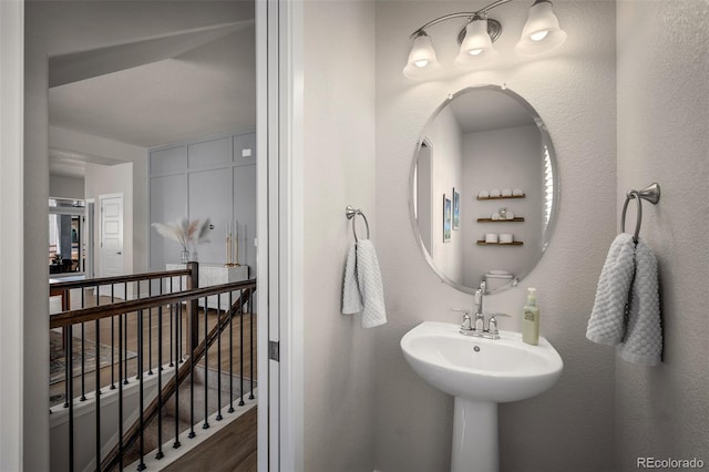 bathroom featuring wood finished floors