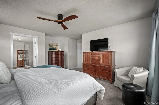 bedroom with baseboards, light colored carpet, a textured ceiling, and ceiling fan