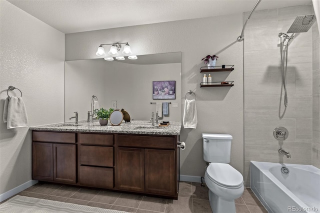 bathroom featuring double vanity, tub / shower combination, toilet, and a sink