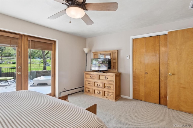 bedroom featuring a baseboard heating unit, access to outside, light carpet, and a ceiling fan