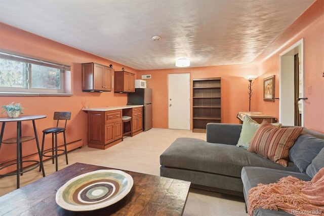 living area featuring light carpet