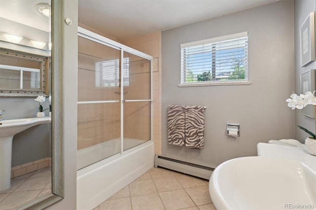 bathroom with baseboard heating, tile patterned floors, and enclosed tub / shower combo