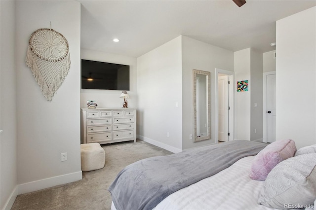 bedroom with recessed lighting, baseboards, and light colored carpet