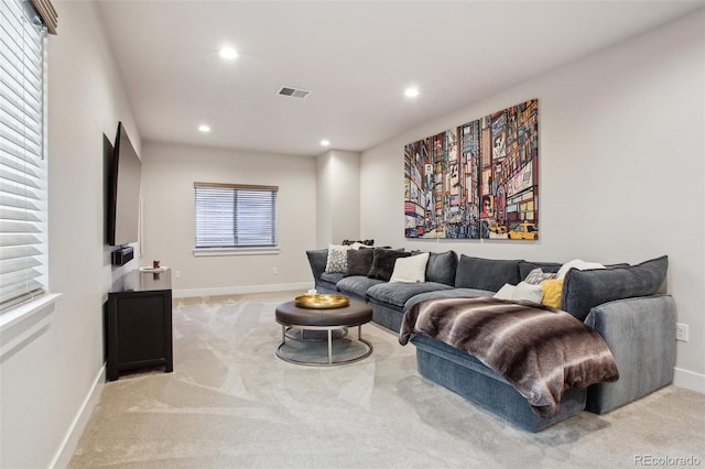 living area featuring recessed lighting, visible vents, carpet flooring, and baseboards