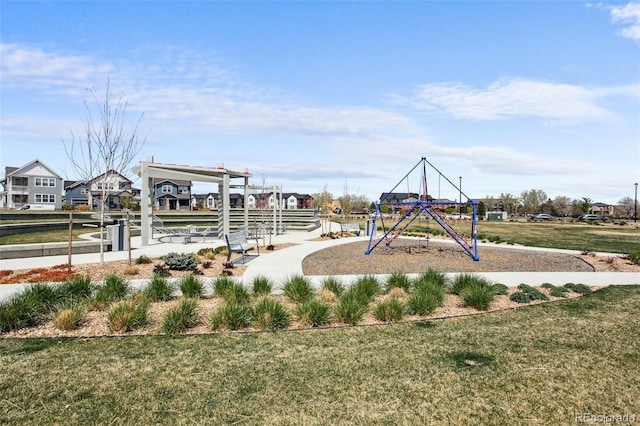 community jungle gym with a yard
