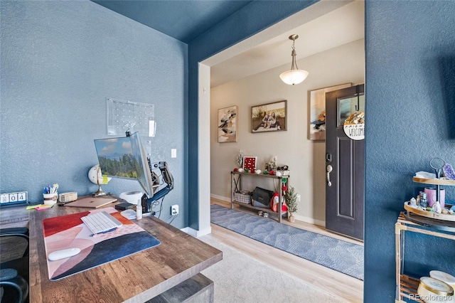 entrance foyer featuring light hardwood / wood-style floors