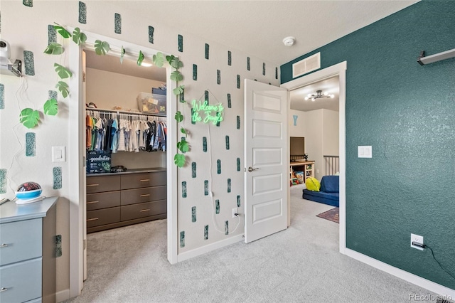 244 Chipeta Way, Lochbuie, CO 80603 - bedroom with a spacious closet, a closet, carpet flooring, and baseboards