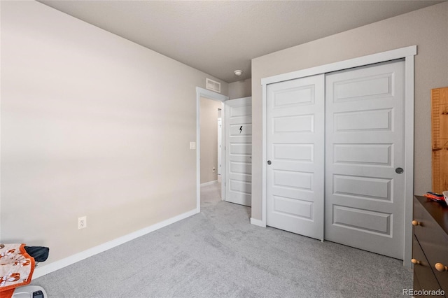 244 Chipeta Way, Lochbuie, CO 80603 - unfurnished bedroom featuring carpet flooring, baseboards, and a closet