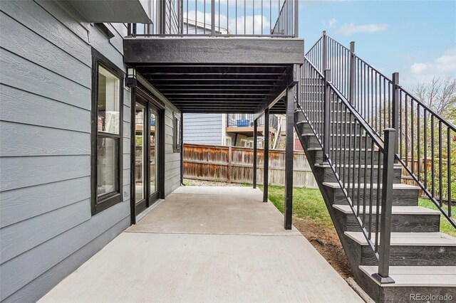 1057 English Sparrow Trl, Highlands Ranch, CO 80129 - view of patio / terrace with fence and stairs