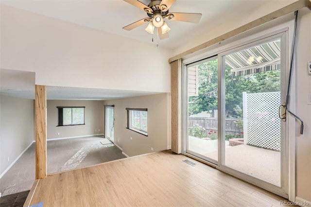 1729 S Ouray Ct, Aurora, CO 80017 - unfurnished living room featuring wood finished floors and a ceiling fan