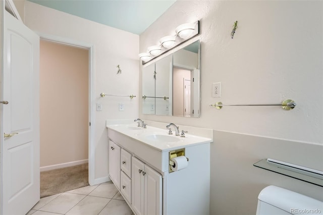 1729 S Ouray Ct, Aurora, CO 80017 - bathroom featuring double vanity and tile patterned floors