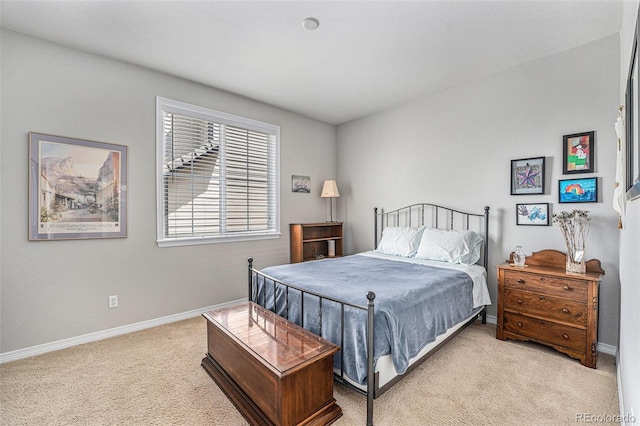 10994 Shadowbrook Cir, Highlands Ranch, CO 80130 - bedroom featuring light carpet and baseboards