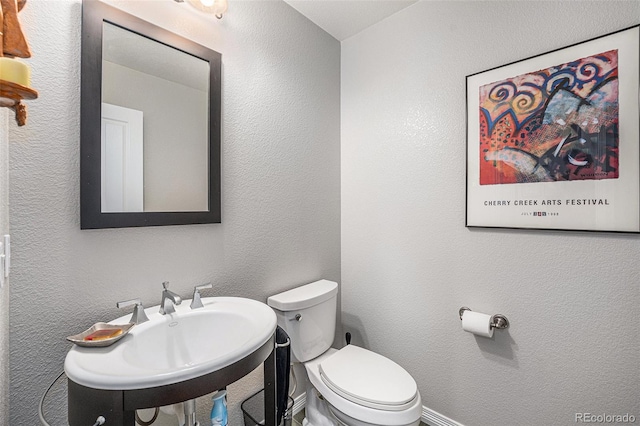 10994 Shadowbrook Cir, Highlands Ranch, CO 80130 - half bath with toilet and a sink