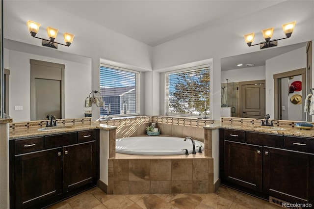 bathroom with plus walk in shower and vanity