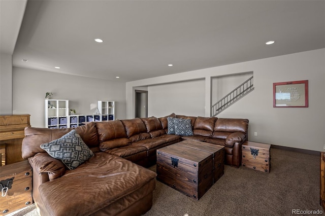 living room featuring dark colored carpet