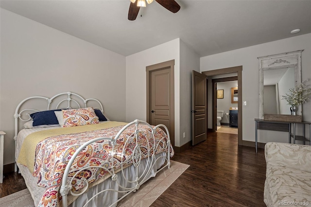 bedroom with ceiling fan and dark wood-type flooring