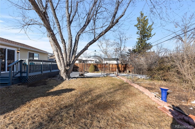 view of yard featuring a wooden deck