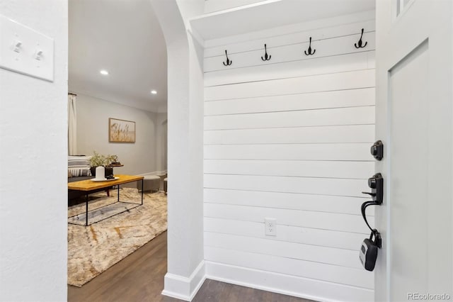 mudroom with dark hardwood / wood-style floors