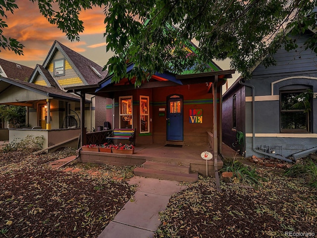 view of front of property featuring covered porch