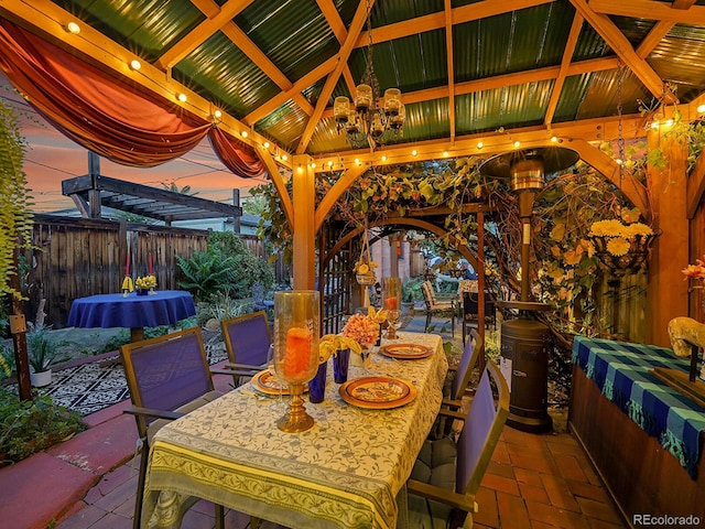 view of patio / terrace featuring a gazebo and fence