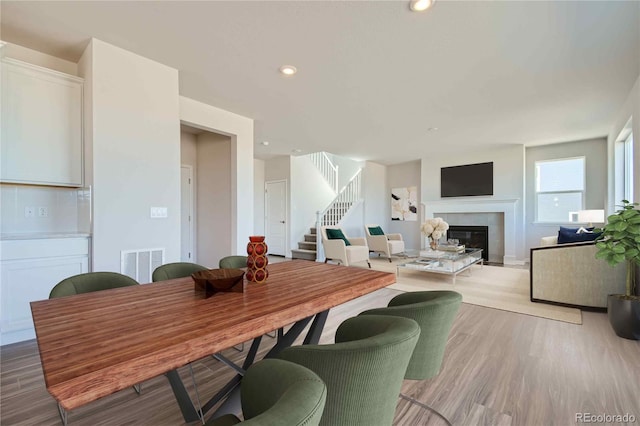 dining room with light hardwood / wood-style floors