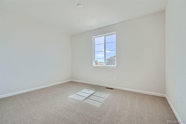 empty room with carpet floors