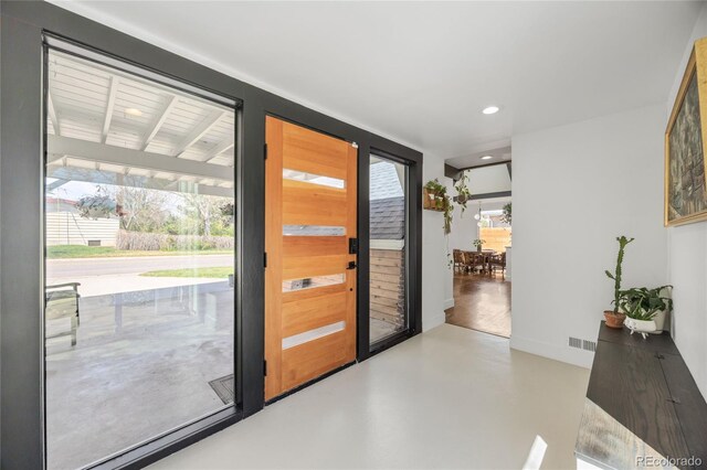 1380 S Dahlia St, Denver, CO 80222 - foyer featuring visible vents, finished concrete floors, and recessed lighting