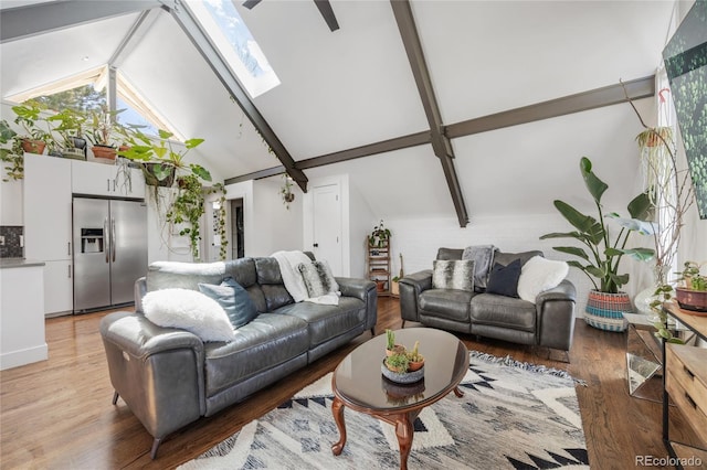 1380 S Dahlia St, Denver, CO 80222 - living room with high vaulted ceiling, light wood-style flooring, beam ceiling, and a skylight