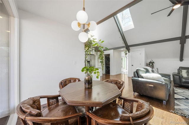 1380 S Dahlia St, Denver, CO 80222 - dining area with ceiling fan, a healthy amount of sunlight, wood finished floors, and a skylight