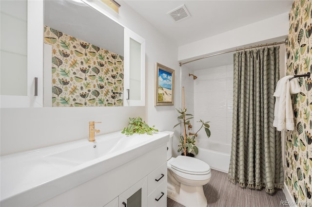 1380 S Dahlia St, Denver, CO 80222 - bathroom with visible vents, toilet, vanity, and shower / bath combination with curtain