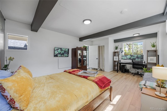 1380 S Dahlia St, Denver, CO 80222 - bedroom featuring light wood-style floors and beamed ceiling