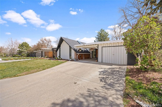 1380 S Dahlia St, Denver, CO 80222 - view of front of property with board and batten siding, driveway, a front lawn, and an attached carport